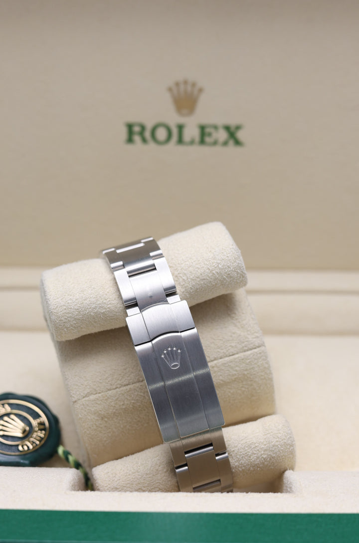 Rolex Oyster Perpetual Red Stainless Steel 31mm - 277200